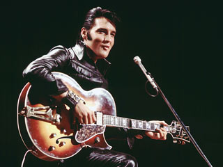 Elvis performing to a crowd